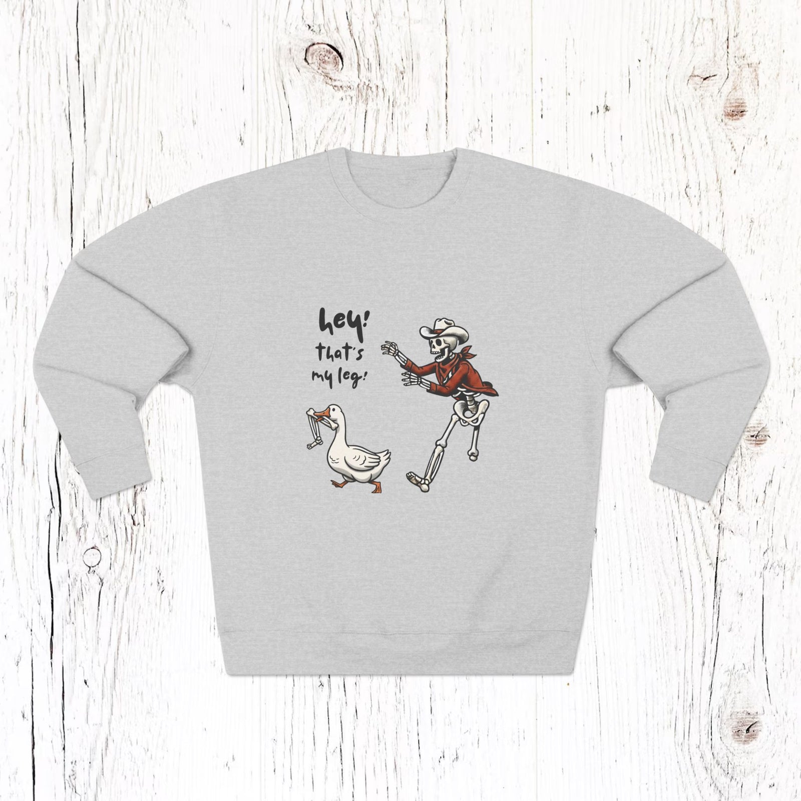 Hey! That’s My Leg! Funny Skeleton Cowboy Sweatshirt - Western Goose Halloween Crewneck