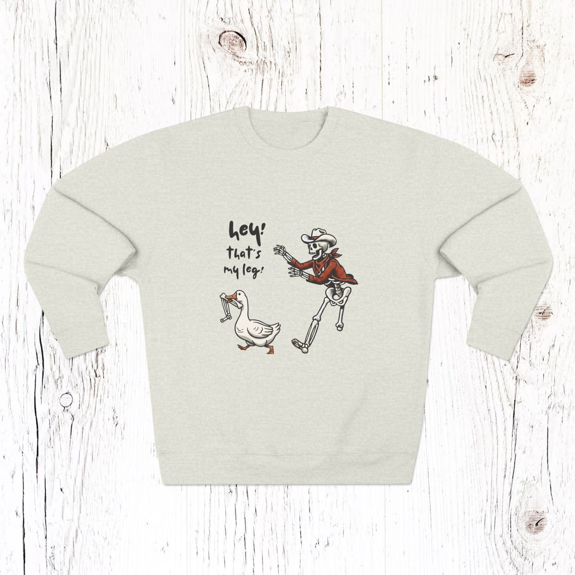 Hey! That’s My Leg! Funny Skeleton Cowboy Sweatshirt - Western Goose Halloween Crewneck