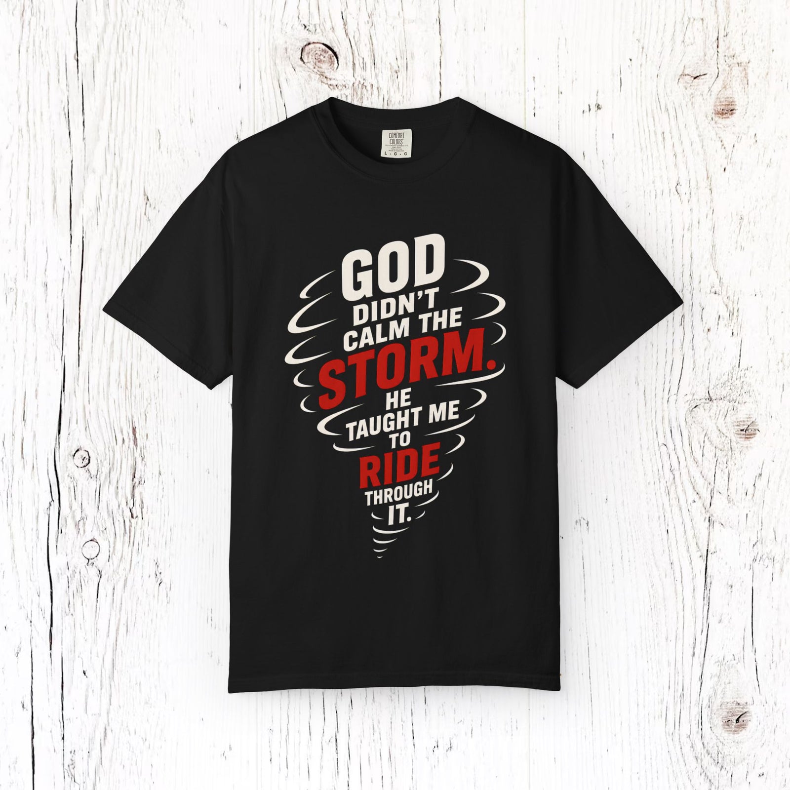 God Didn't Calm the Storm He Taught Me to Ride Through It | Christian Faith T-Shirt