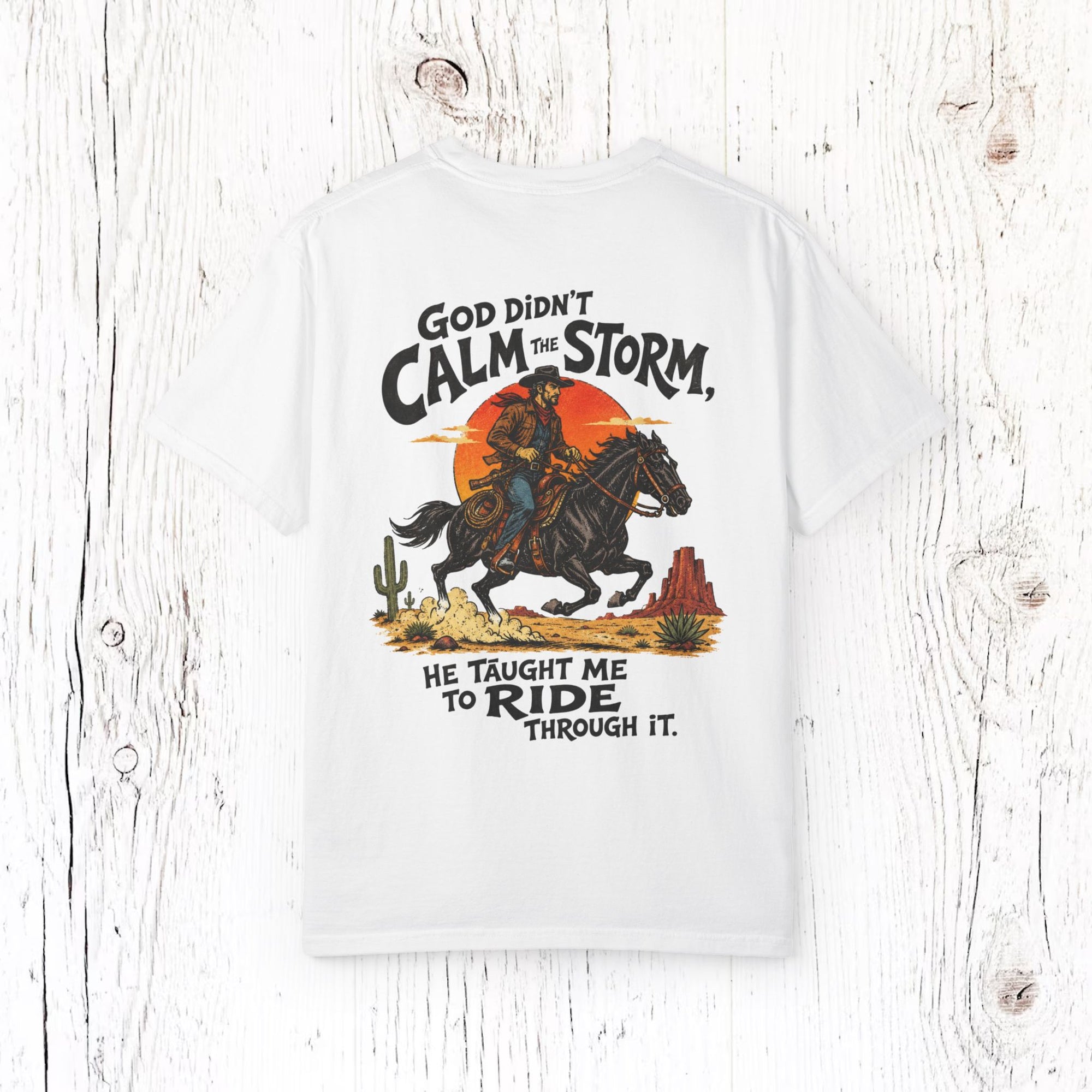 "God Didn’t Calm the Storm, He Taught Me to Ride Through It" Western Graphic T-Shirt